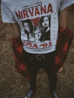 Person Wearing White and Red Nirvana Top